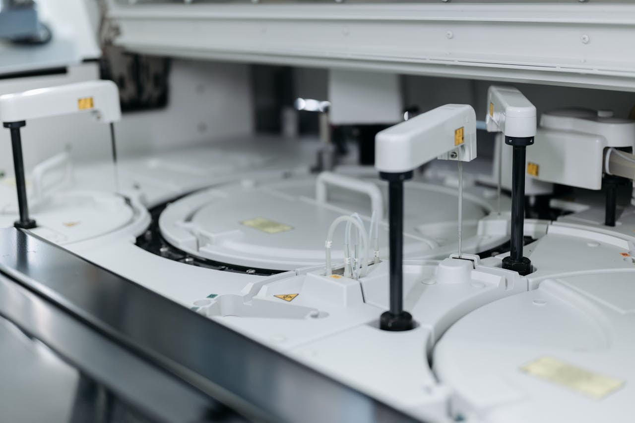 Close-up of advanced laboratory machinery in a medical facility, showcasing precise scientific equipment.